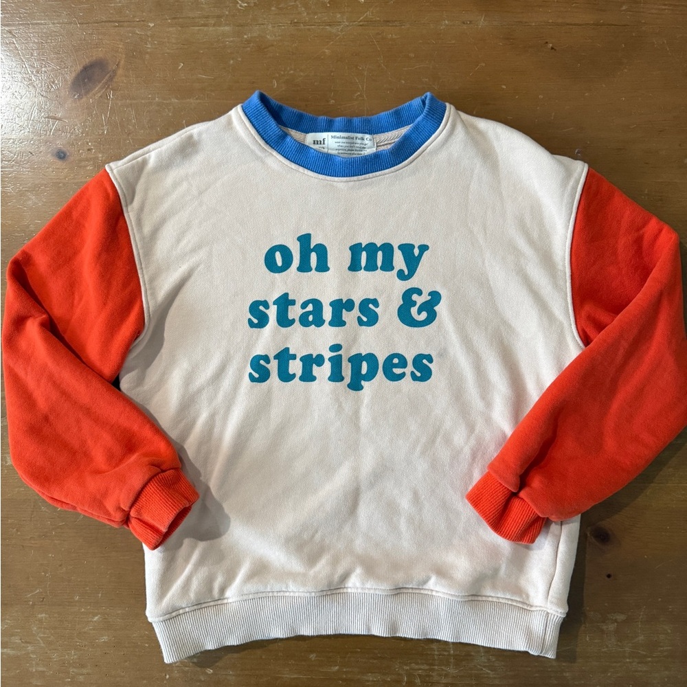 Minimalist folk Red and White Sweatshirt with Blue Text